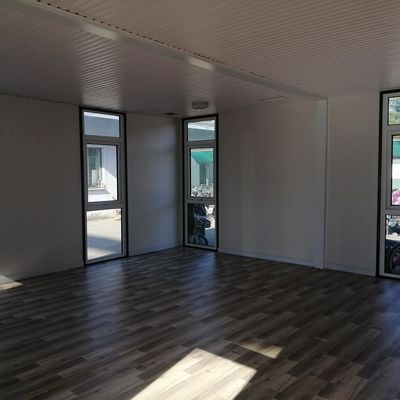 Afneembare containerhuizen voor wonen van 18 mm MGO-bord, ondersteund door een PVC-schuifvenster